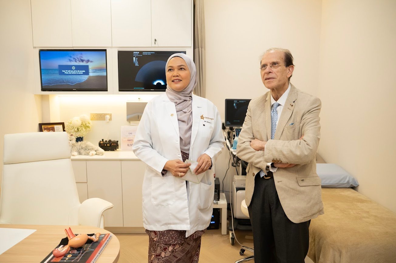 Dr Adilah with Dr Robert Fischer at Star Iman